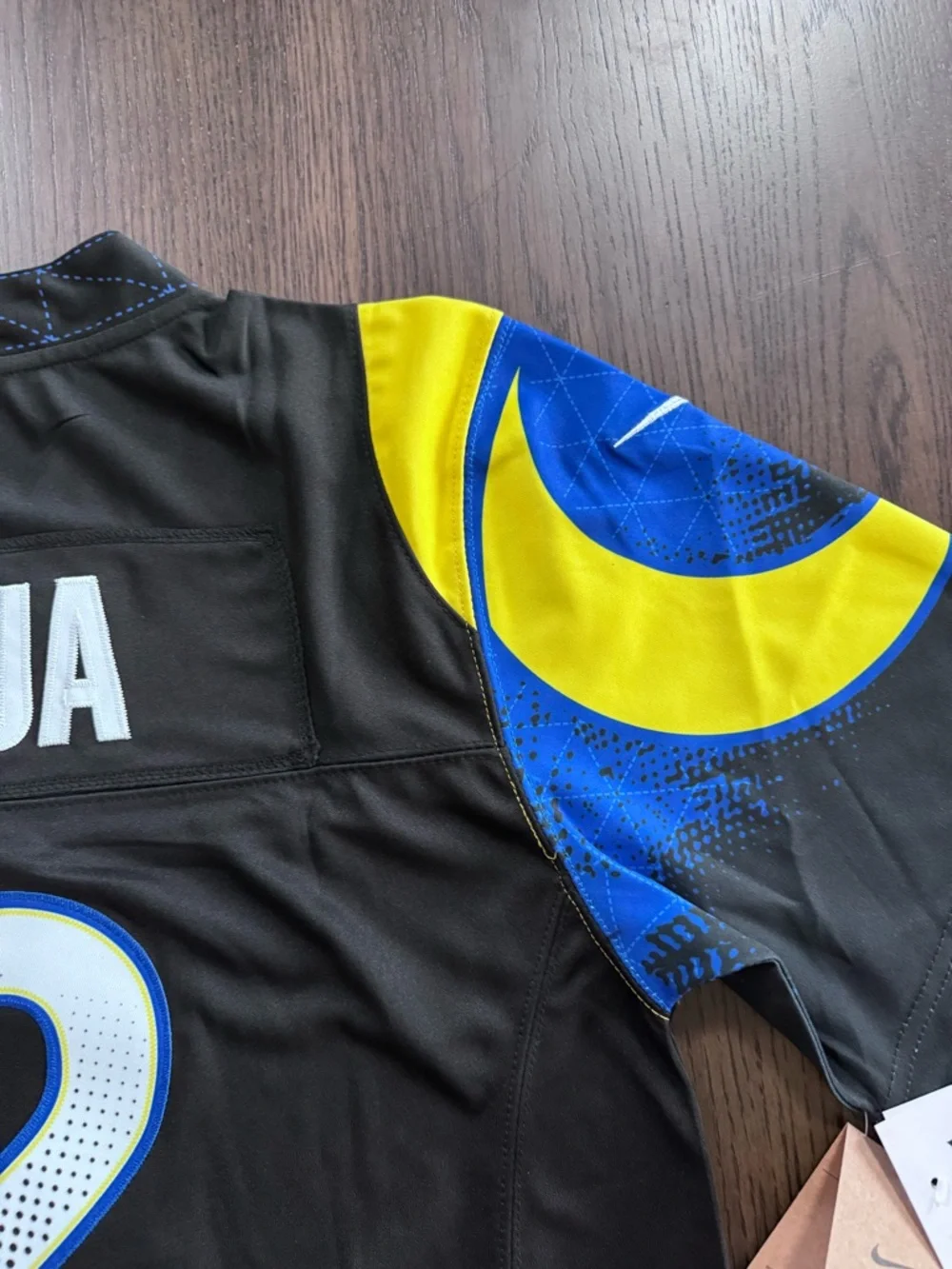Nike Los Angeles Rams Black Jersey with Blue and Yellow Accents #12